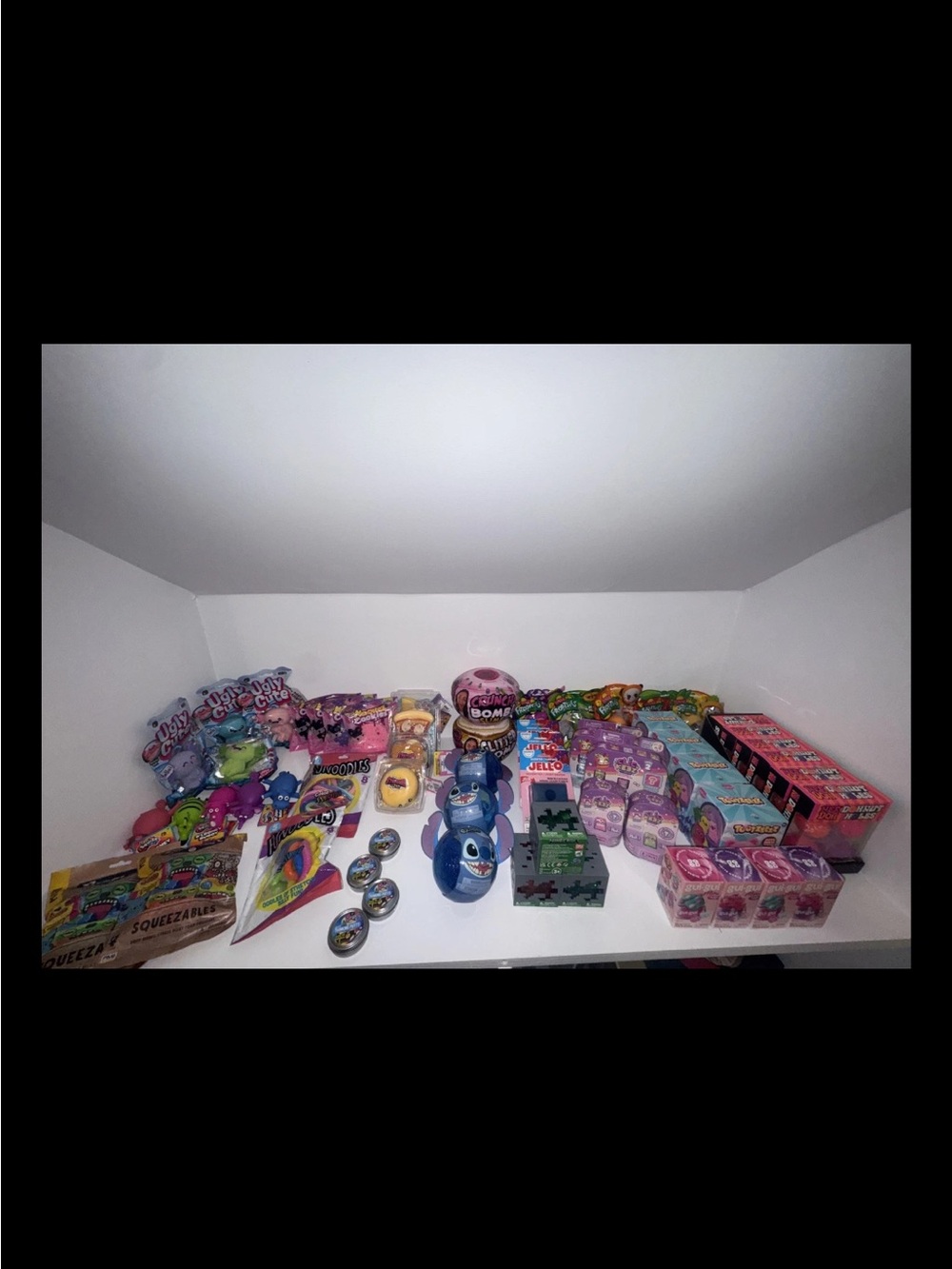Assorted huge lot 60 items popular toys, fidgets, squishes hard to find items